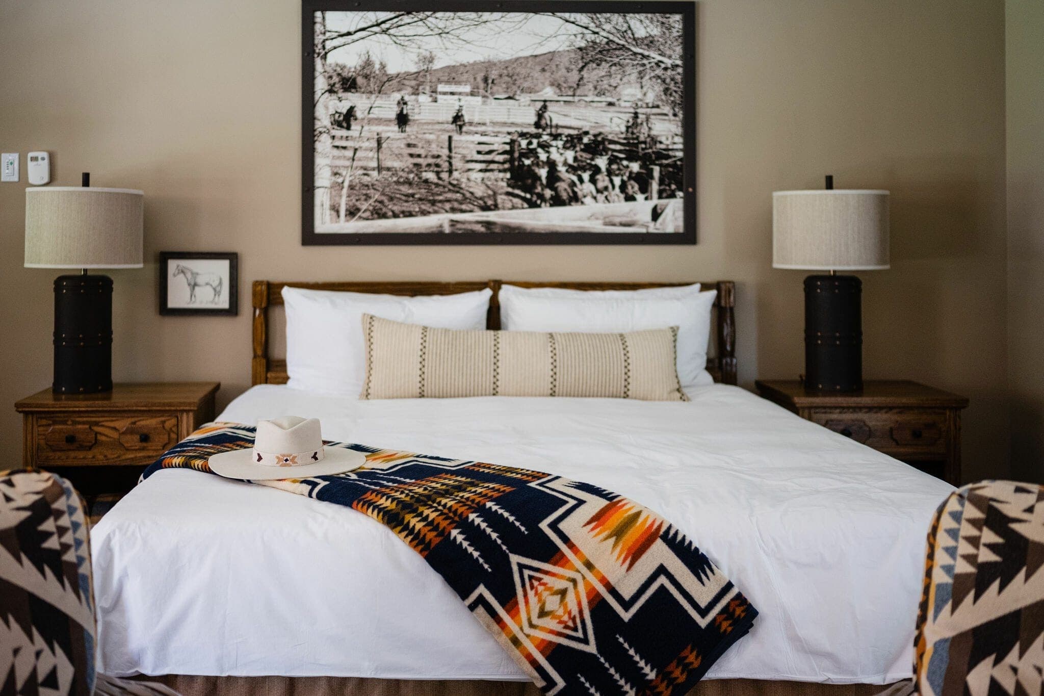 queen bed with side tables inside golf view cottage