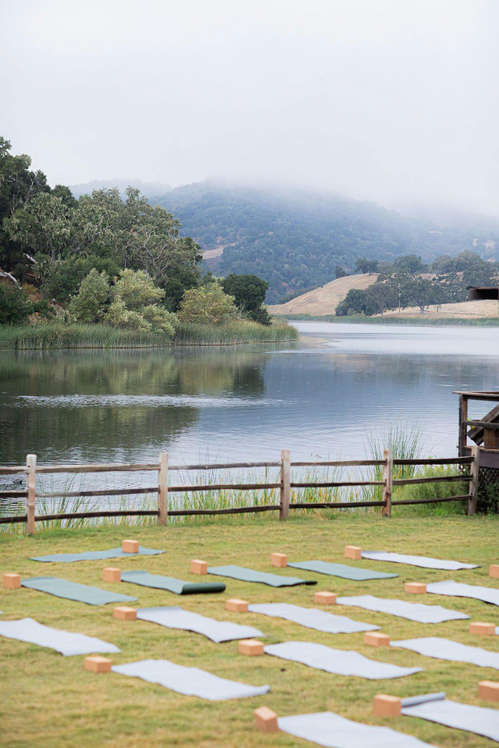 yoga setup by a lake
